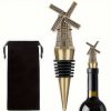 1699429891749-ca34f8f162a44f309679e42656acf2d6-gg Windmill bottle stopper - wine cork gold